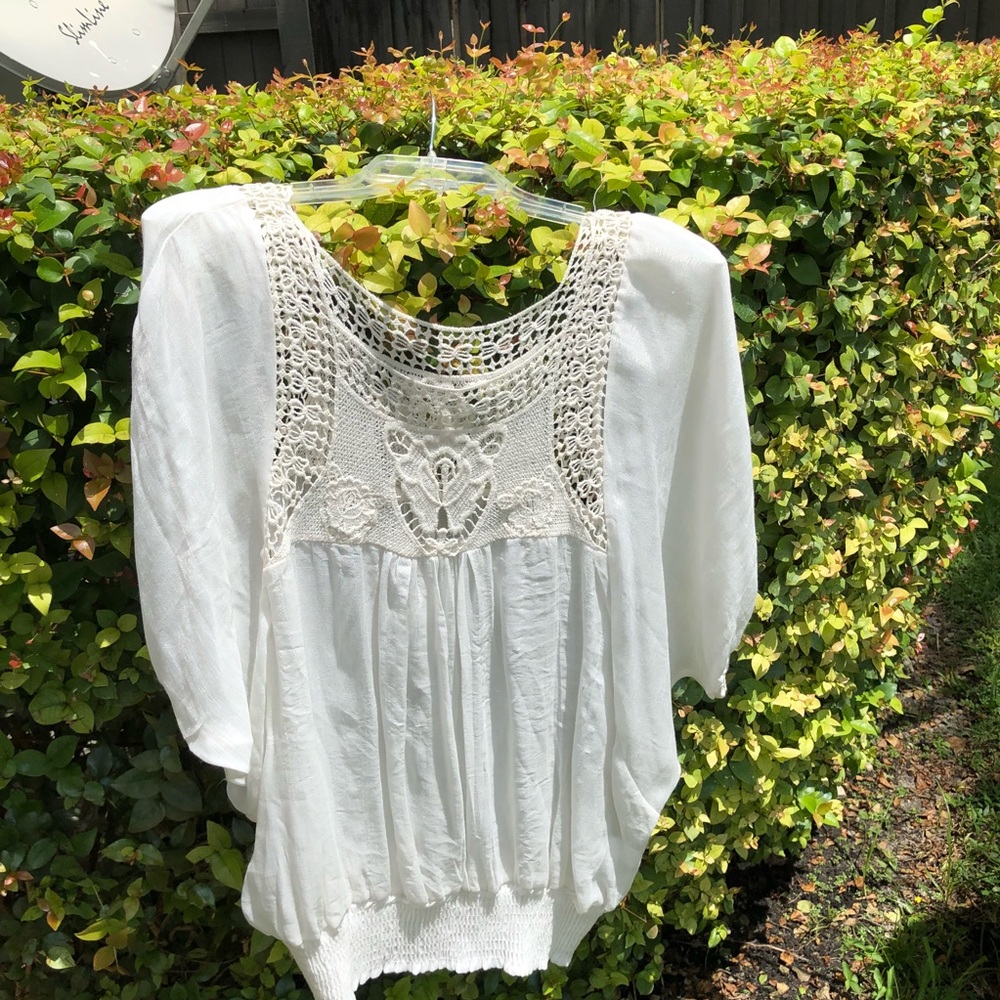 White flowy top with crochet detail